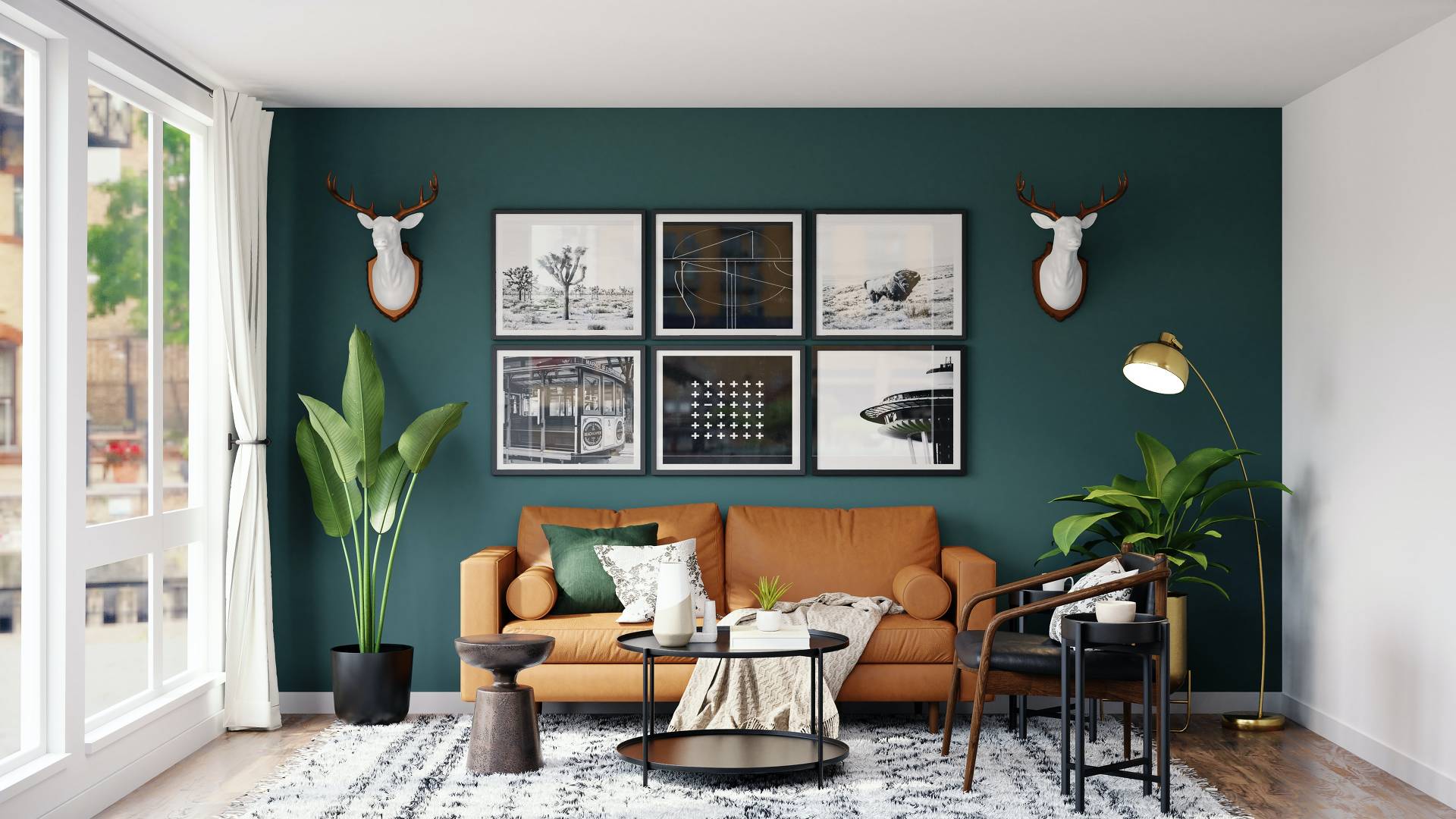 Wohnzimmer mit Sofa und Bildern an der Wand
